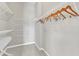 Organized walk-in closet with adjustable shelving and hanging rods at 3001 Imperial Oaks Dr, Raleigh, NC 27614