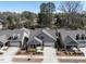 An aerial view shows the well maintained landscaping, modern roof and siding of this lovely home at 3009 Kildaire Dairy Way, Apex, NC 27539