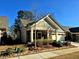 Beautifully landscaped front yard of this house, featuring a lovely tree and shrubbery at 3009 Kildaire Dairy Way, Apex, NC 27539