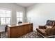 Bright office featuring two windows and a stylish executive desk at 3009 Kildaire Dairy Way, Apex, NC 27539