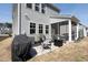 Spacious backyard with a patio, comfortable seating, and lush landscaping at 3144 Star Gazing Ln, Durham, NC 27703