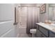 Well-lit bathroom with a shower-tub combo, modern vanity, and stylish neutral decor at 3144 Star Gazing Ln, Durham, NC 27703