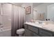 Bright bathroom featuring a shower-tub combo, updated vanity, and modern fixtures at 3144 Star Gazing Ln, Durham, NC 27703
