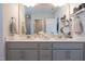 Spacious bathroom featuring double sinks, modern lighting, and stylish decor at 3144 Star Gazing Ln, Durham, NC 27703