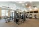 Well-equipped fitness center featuring modern exercise machines and ample natural light for a healthy lifestyle at 3144 Star Gazing Ln, Durham, NC 27703