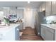 Modern kitchen featuring stainless steel appliances, sleek countertops, and ample cabinet space at 3144 Star Gazing Ln, Durham, NC 27703