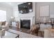 Stylish living room showcasing a modern fireplace with mounted TV and elegant decor at 3144 Star Gazing Ln, Durham, NC 27703