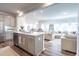 Bright, open-concept living spaces featuring a modern kitchen, dining area, and cozy living room at 3144 Star Gazing Ln, Durham, NC 27703