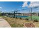A community tennis and basketball court surrounded by lush greenery and well-maintained landscaping at 3144 Star Gazing Ln, Durham, NC 27703