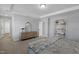 Comfortable bedroom with carpet, tray ceiling, dresser, and gold shelving unit at 3360 Brevet St, New Hill, NC 27562