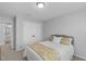 Comfortable carpeted bedroom featuring a queen bed and good closet space at 3360 Brevet St, New Hill, NC 27562