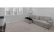Comfortable living room featuring plush seating, natural light, and a calming atmosphere with a neutral color palette at 3360 Brevet St, New Hill, NC 27562