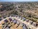 Aerial view of a neighborhood showing the surrounding area and some houses with solar panels at 3557 S Beaver Ln, Raleigh, NC 27604