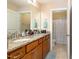 Spacious bathroom with granite countertops, double vanity, tile flooring, and shower at 3557 S Beaver Ln, Raleigh, NC 27604