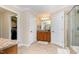 Well-appointed bathroom with a walk-in shower, granite vanity, and neutral tile, offering a spa-like experience at 3557 S Beaver Ln, Raleigh, NC 27604