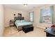 Cozy bedroom with carpet floors, natural light, and decorated with a soccer theme at 3557 S Beaver Ln, Raleigh, NC 27604