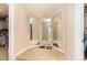 Large walk-in closet with ample hanging space, shelving, and mirrors, providing organized storage solutions at 3557 S Beaver Ln, Raleigh, NC 27604