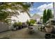 Backyard featuring brick pavers, string lights, seating, and landscaping at 4026 Overcup Oak Ln, Cary, NC 27519