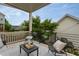 Relaxing balcony with comfortable seating and stylish outdoor decor, perfect for enjoying fresh air and views at 4026 Overcup Oak Ln, Cary, NC 27519