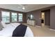Comfortable bedroom with a view into the ensuite bathroom, with lots of natural light at 4026 Overcup Oak Ln, Cary, NC 27519