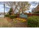 Attractive brick community entrance with lush landscaping and clear signage at 4026 Overcup Oak Ln, Cary, NC 27519