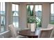 Bright and inviting dining nook with large windows at 4026 Overcup Oak Ln, Cary, NC 27519