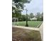 Well-manicured soccer field with green artificial turf, soccer goals, and a walking path on the exterior at 4026 Overcup Oak Ln, Cary, NC 27519