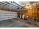 Spacious two-car garage with ample storage, shelving, and a well-maintained concrete floor at 4026 Overcup Oak Ln, Cary, NC 27519