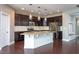 Spacious kitchen island with granite countertops and stainless steel appliances at 4026 Overcup Oak Ln, Cary, NC 27519