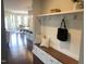 A mud room with bench seating and storage hooks at 4026 Overcup Oak Ln, Cary, NC 27519