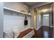 Charming mudroom with built-in bench, coat hooks, and storage, conveniently located near the entrance at 4026 Overcup Oak Ln, Cary, NC 27519