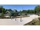 An amenity with tennis courts, playground, fire hydrant, and shelter providing diverse activities in a well-kept outdoor space at 4026 Overcup Oak Ln, Cary, NC 27519