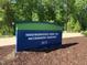 A view of the park sign, indicating it's the Neighborhood Park on McCrimmon Parkway at the address 3870 at 4026 Overcup Oak Ln, Cary, NC 27519