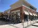 Street view of retail shop/restaurant with a patio, outdoor seating, and wheelchair accessible sidewalk at 4026 Overcup Oak Ln, Cary, NC 27519