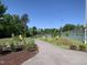 View of tennis courts with manicured landscaping and clear pathways inviting recreation and community engagement at 4026 Overcup Oak Ln, Cary, NC 27519