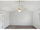Spacious bedroom featuring high ceilings, neutral paint, and a fan at 4507 Lazyriver Dr, Durham, NC 27712