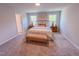 Large bedroom with neutral carpet and natural light at 452 Duncan Creek Rd # 156, Lillington, NC 27546
