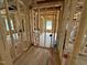 Unfinished bedroom showcasing wood-framed walls and electrical outlets at 452 Duncan Creek Rd # 156, Lillington, NC 27546
