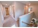 Bright upstairs hallway leading to bedrooms at 452 Duncan Creek Rd # 156, Lillington, NC 27546