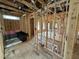 Unfinished room with exposed studs, plumbing and ductwork, showcasing the home's infrastructure at 452 Duncan Creek Rd # 156, Lillington, NC 27546