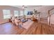 Bright living room with hardwood floors, modern decor, and natural light at 452 Duncan Creek Rd # 156, Lillington, NC 27546