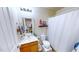 Small bathroom features a sink, toilet and various toiletries at 507 Southwick Pl, Mebane, NC 27302