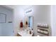 Well-lit bathroom with a single vanity, complemented by rustic towel and toilet paper holders at 507 Southwick Pl, Mebane, NC 27302