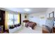 Bright bedroom contains a window, bed and walls are decorated with UPS decor at 507 Southwick Pl, Mebane, NC 27302
