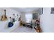 Music room has several guitars and a keyboard at 507 Southwick Pl, Mebane, NC 27302