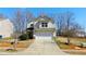 Inviting two-story home with a well-manicured lawn, showcasing a classic suburban charm with great curb appeal at 507 Southwick Pl, Mebane, NC 27302