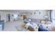 Open living room features neutral tones, a sectional sofa, and is conveniently located by the dining area and kitchen at 507 Southwick Pl, Mebane, NC 27302