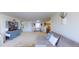 Open living room features a sectional sofa and is conveniently located by the dining area and kitchen at 507 Southwick Pl, Mebane, NC 27302