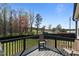 View from the back deck looking out at the expansive and beautifully treed backyard at 511 Mcarthur Rd, Broadway, NC 27505