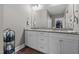 Bright bathroom features double sinks, granite countertop and access to a walk-in closet at 511 Mcarthur Rd, Broadway, NC 27505